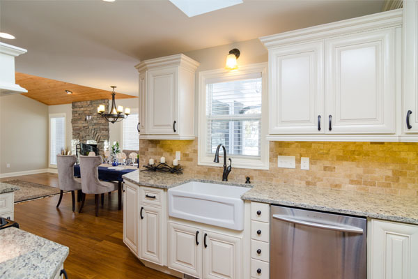 kitchen with white cabinets and granite countertops