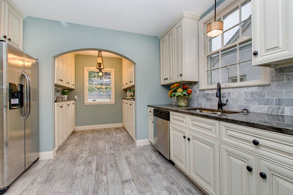 kitchen with white cabinets and granite countertops